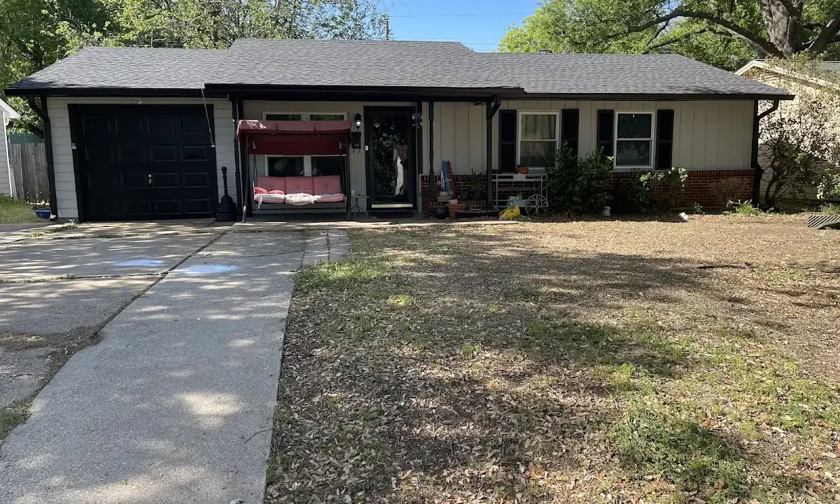 Asphalt Shingle Roof Repair crew at work on a residential roof in Humble